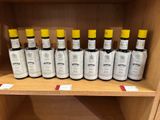 several bottles of wine on a shelf in a store