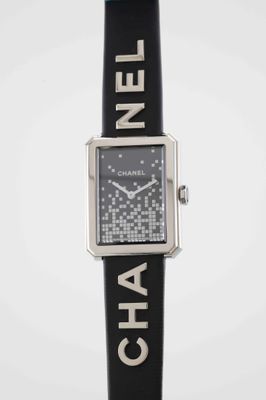 chanel watch with black leather strap and silver case
