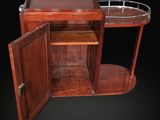 a wooden table with a glass tray on top of it