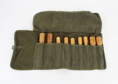 a roll up case with wooden crochets in it