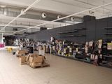 a large room with a lot of items on the shelves