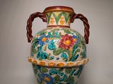 a large vase with a handle on a white background