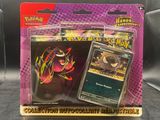 two pokemon trading cards are in a package on a table