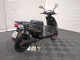 a scooter that is parked in a garage