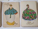 several cards with different designs of women in dresses on them