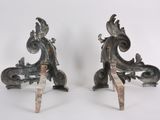pair of antique bronze sculptures of a dragon and a bird on a stand
