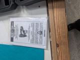 a piece of paper on the table next to a pair of scissors