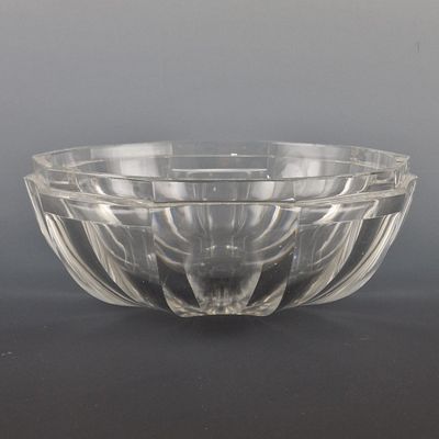 a glass bowl that is sitting on a table