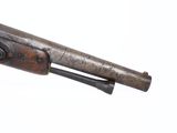 a close up of a rifle on a white background with a white background