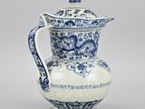 blue and white porcelain pitcher with a dragon handle