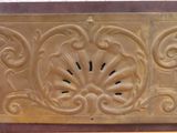 a close up of a decorative design on a wall