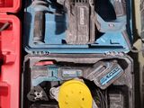 two tools that are sitting on a table