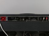 a close up of a guitar amp with a speaker in the back