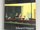 a book that has a picture of people sitting at a table