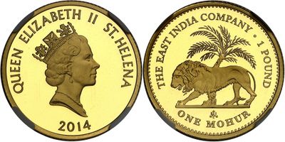a gold coin with a lion and palm tree on it