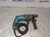 a drill that is sitting on a table