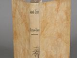 an old book with a picture of a palm tree on it