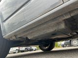 a close up view of a car ' s tire on the road