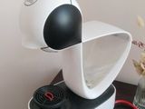 a coffee maker that is sitting on a table