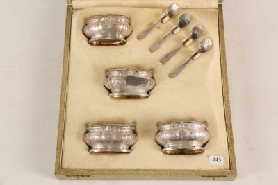 silverware in a box with spoons, forks and spoons in it