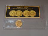 a close up of a coin in a clear plastic holder