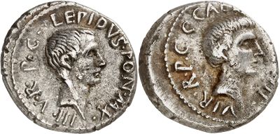 a silver coin with an image of a man on it