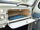 a car door with a small tray in it