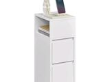 une armoire blanche sur laquelle est posé un téléphone