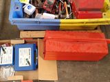 many different types of tools in a box on the floor