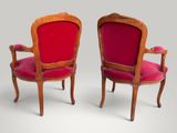 pair of louis xv style armchairs with red velvet upholstered seats