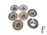 six plates with pictures of people and animals on them