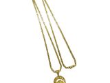 a gold plated necklace with a spartan head on a chain