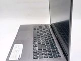 a laptop computer sitting on top of a white table