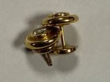 a picture of a pair of gold earrings on a piece of paper