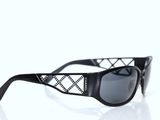 sunglasses on a white background with a black frame and a diamond pattern