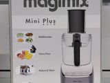 un carton contenant un robot ménager Magimix Mini Plus en vitrine