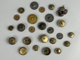 many different types of buttons on a white surface