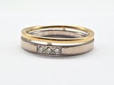 deux bagues en or et en argent serties de diamants sur fond blanc