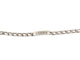 an image of a silver bracelet with a tag on it