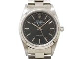Montre Rolex Day-Date en acier inoxydable, avec cadran noir et chiffres romains