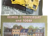 a box with a picture of a house in it