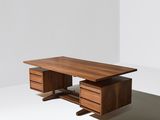 an image of a wooden desk with two drawers on top of it