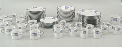 a lot of cups and saucers on the table