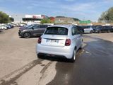 many cars parked in a parking lot in a parking lot