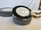 a lot of plates that are stacked on a table