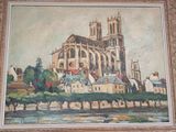 une peinture représentant un grand bâtiment accrochée au mur