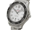 a close up of a watch on a white background with a white background