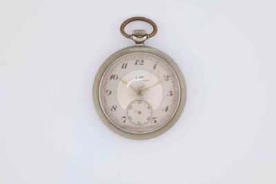 a silver pocket watch on a white surface