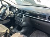 a picture of a car with a dashboard and a steering wheel