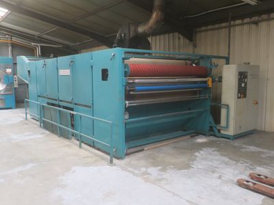 a large machine that is working in a factory